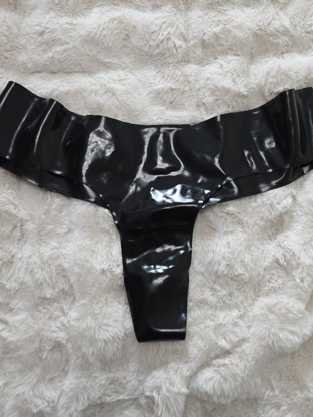 Black latex thong